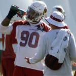 Defensive lineman Robert Nkemdiche quenches his thirst during Cardinals mini-camp Wednesday, June 8. (Photo by Adam Green/Arizona Sports)