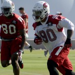 Defensive lineman Robert Nkemdiche runs down the field with tight end Ifeanyi Momah trailing during Cardinals mini-camp Wednesday, June 8. (Photo by Adam Green/Arizona Sports)
