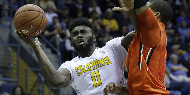 California's Jaylen Brown, left, shoots against Oregon State's Maurice O'Field in the second half o...