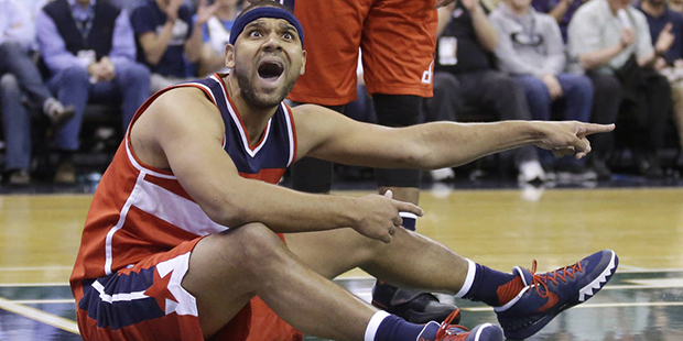 Washington Wizards forward Jared Dudley shouts to a referee after being called with a foul against ...