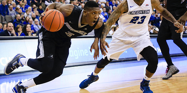 Providence's Kris Dunn (3) drives to the basket past Creighton's James Milliken (23) during the sec...