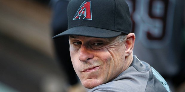 Arizona Diamondbacks manager Chip Hale stands in the dugout before a baseball game against the Pitt...