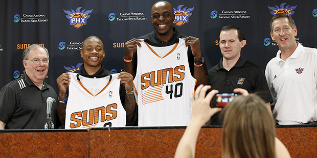 From left to right, Lon Babby, Phoenix Suns President of Basketball Operations, Isaiah Thomas, Anth...