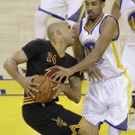 Cleveland Cavaliers forward Richard Jefferson (24) is defended by Golden State Warriors guard Shaun Livingston during the first half of Game 7 of basketball's NBA Finals in Oakland, Calif., Sunday, June 19, 2016. (AP Photo/Eric Risberg)