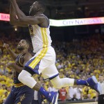 Golden State Warriors forward Draymond Green shoots against Cleveland Cavaliers center Tristan Thompson during the first half of Game 2 of basketball's NBA Finals in Oakland, Calif., Sunday, June 5, 2016. (AP Photo/Marcio Jose Sanchez)
