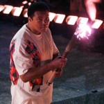 FILE - In this July 19, 1996, file photo, Muhammad Ali watches as the flame climbs up to the Olympic torch during the opening ceremonies of the Summer Olympics, in Atlanta. Ali, the magnificent heavyweight champion whose fast fists and irrepressible personality transcended sports and captivated the world, has died according to a statement released by his family Friday, June 3, 2016. He was 74. (AP Photo/Doug Mills, File)