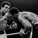 FILE - In this Oct. 1, 1975, file photo, Muhammad Ali's throws a right at Joe Frazier in the 13th round in their title bout in Manila, Philippines. Ali, the magnificent heavyweight champion whose fast fists and irrepressible personality transcended sports and captivated the world, has died according to a statement released by his family Friday, June 3, 2016. He was 74. (AP Photo/FILE)