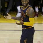 Cleveland Cavaliers forward LeBron James gestures during the first half of Game 2 of basketball's NBA Finals between the Golden State Warriors and the Cavaliers in Oakland, Calif., Sunday, June 5, 2016. (AP Photo/Ben Margot)