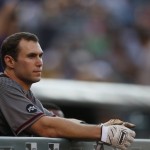 Arizona Diamondbacks' Paul Goldschmidt leans over the dugout rail as he waits to bat against the Colorado Rockies in the first inning of a baseball game Thursday, June 23, 2016, in Denver. (AP Photo/David Zalubowski)