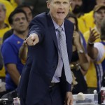 Golden State Warriors head coach Steve Kerr gestures during the first half of Game 7 of basketball's NBA Finals between the Warriors and the Cleveland Cavaliers in Oakland, Calif., Sunday, June 19, 2016. (AP Photo/Marcio Jose Sanchez)
