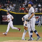 Tampa Bay Rays' Chris Archer, right, pauses on the mound after giving up a home run to Arizona Diamondbacks' Robbie Ray, left, during the third inning of a baseball game Monday, June 6, 2016, in Phoenix. (AP Photo/Ross D. Franklin)