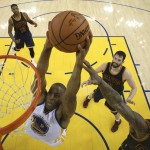 Golden State Warriors forward Andre Iguodala (9) dunks against the Cleveland Cavaliers during the first half of Game 2 of basketball's NBA Finals in Oakland, Calif., Thursday, June 2, 2016. (Ezra Shaw, Getty Images via AP, Pool)