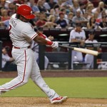 Philadelphia Phillies' Maikel Franco connects for a run-scoring single against the Arizona Diamondbacks during the sixth inning of a baseball game Monday, June 27, 2016, in Phoenix. (AP Photo/Ross D. Franklin)