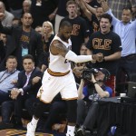 Cleveland Cavaliers forward LeBron James (23) celebrates a basket against the Golden State Warriors during the second half of Game 6 of basketball's NBA Finals in Cleveland, Thursday, June 16, 2016. (AP Photo/Ron Schwane)