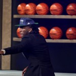 Taurean Prince reacts as he walks up on stage after being selected 12th overall by the Utah Jazz during the NBA basketball draft, Thursday, June 23, 2016, in New York. (AP Photo/Frank Franklin II)