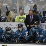 San Jose Sharks head coach Peter DeBoer stands behind players on the bench after the Pittsburgh Penguins' Eric Fehr scored a goal during the third period of Game 4 of the NHL hockey Stanley Cup Finals in San Jose, Calif., Monday, June 6, 2016. Pittsburgh won the game 3-1. (AP Photo/Eric Risberg)