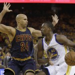 Golden State Warriors forward Harrison Barnes (40) dribbles against Cleveland Cavaliers forward Richard Jefferson (24) during the first half of Game 2 of basketball's NBA Finals in Oakland, Calif., Sunday, June 5, 2016. (AP Photo/Marcio Jose Sanchez)