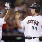 Arizona Diamondbacks' Paul Goldschmidt (44) celebrates his two-run home run against the Tampa Bay Rays with Michael Bourn (1) during the sixth inning of a baseball game Tuesday, June 7, 2016, in Phoenix. (AP Photo/Ross D. Franklin)
