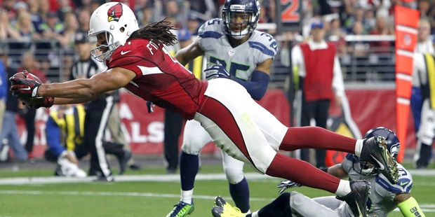 Arizona Cardinals wide receiver Larry Fitzgerald (11) scores a touchdown against the Seattle Seahaw...