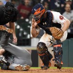 Arizona Diamondbacks' Jake Lamb falls down after being hit by a pitch from Houston Astros starting pitcher Dallas Keuchel as home plate umpire Ron Kulpa (46) and catcher Evan Gattis look on during the seventh inning of a baseball game, Thursday, June 2, 2016, in Houston. (AP Photo/Eric Christian Smith)