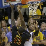 Cleveland Cavaliers forward LeBron James (23) shoots against Golden State Warriors forward Marreese Speights during the first half of Game 7 of basketball's NBA Finals in Oakland, Calif., Sunday, June 19, 2016. (AP Photo/Marcio Jose Sanchez)