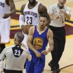Golden State Warriors guard Stephen Curry reacts to being called for his sixth foul on Cleveland Cavaliers forward LeBron James (23) during the second half of Game 6 of basketball's NBA Finals in Cleveland, Thursday, June 16, 2016. (AP Photo/Ron Schwane)