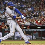 Los Angeles Dodgers' Scott Van Slyke connects for a three-run home run against the Arizona Diamondbacks during the sixth inning of a baseball game Wednesday, June 15, 2016, in Phoenix. (AP Photo/Ross D. Franklin)