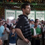 Boston Celtics head coach Brad Stevens waits to address the crowd at TD Garden, Thursday, June 23, 2016, at the Celtics NBA Draft Party in Boston. The Celtics selected Jaylen Brown, a forward from California, with the third pick in the NBA basketball draft. (AP Photo/Elise Amendola)