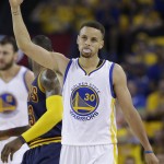 Golden State Warriors guard Stephen Curry (30) gestures during the first half of Game 1 of basketball's NBA Finals against the Cleveland Cavaliers in Oakland, Calif., Thursday, June 2, 2016. (AP Photo/Marcio Jose Sanchez)