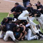 Coastal Carolina players celebrate their 4-3 victory over Arizona to win the championship after Game 3 of the NCAA College World Series baseball finals in Omaha, Neb., Thursday, June 30, 2016. (AP Photo/Nati Harnik)