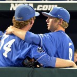 UC Santa Barbara's Noah Davis, left, and Justin Kelly talk in the dugout following the team's 3-0 loss to Arizona in an NCAA College World Series baseball game, Wednesday, June 22, 2016, in Omaha, Neb. (AP Photo/Ted Kirk)