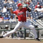 Arizona pitcher Bobby Dalbec throws against Coastal Carolina in the first inning in Game 3 of the NCAA College World Series baseball finals in Omaha, Neb., Thursday, June 30, 2016. (AP Photo/Nati Harnik)