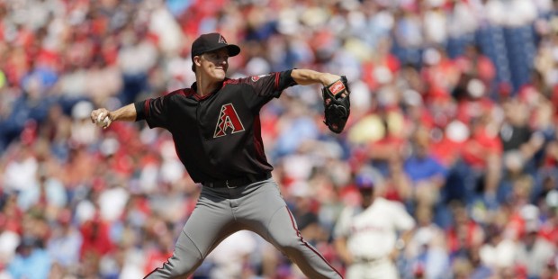 Arizona Diamondbacks' Zack Greinke pitches during the first inning of a baseball game against the P...