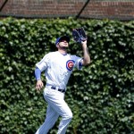 Chicago Cubs left fielder Kris Bryant catches a fly ball hit by Arizona Diamondbacks' Paul Goldschmidt during the first inning of a baseball game Friday, June 3, 2016, in Chicago. (AP Photo/Nam Y. Huh)