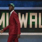 Thon Maker walks off stage after being selected 10th overall by the Milwaukee Bucks during the NBA basketball draft, Thursday, June 23, 2016, in New York. (AP Photo/Frank Franklin II)