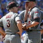 Arizona Diamondbacks manager Chip Hale, left, talks with starter Archie Bradley during the sixth inning of a baseball game against the Chicago Cubs Friday, June 3, 2016, in Chicago. (AP Photo/Nam Y. Huh)