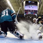 Pittsburgh Penguins' Bryan Rust, right, takes a shot against San Jose Sharks goalie Martin Jones during the third period of Game 4 of the NHL hockey Stanley Cup Finals on Monday, June 6, 2016, in San Jose, Calif. (Bruce Bennett/Getty Images via AP, Pool)