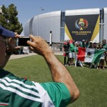 Mexico soccer fans pose for a photo prior to a Copa America Group C soccer match between Mexico and Uruguay at University of Phoenix Stadium Sunday, June 5, 2016, in Glendale, Ariz. (AP Photo/Ross D. Franklin)