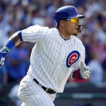 Chicago Cubs' Javier Baez runs after hitting a two-run double against the Arizona Diamondbacks during the eighth inning of a baseball game Friday, June 3, 2016, in Chicago. (AP Photo/Nam Y. Huh)