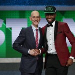 NBA Commissioner Adam Silver, left, poses for a photo with Jaylen Brown after Brown was selected third overall by the Boston Celtics during the NBA basketball draft, Thursday, June 23, 2016, in New York. (AP Photo/Frank Franklin II)