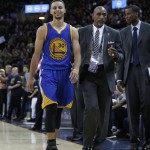 Golden State Warriors guard Stephen Curry (30) leaves the court after fouling out against the Cleveland Cavaliers during the second half of Game 6 of basketball's NBA Finals in Cleveland, Thursday, June 16, 2016. Cleveland won 115-101. (AP Photo/Tony Dejak)