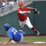 UC Santa Barbara's Kyle Plantier (22) is out at second as Arizona shortstop Louis Boyd turns the double play to end the top of the fifth inning of an NCAA College World Series baseball game, Wednesday, June 22, 2016, in Omaha, Neb. (AP Photo/Ted Kirk)