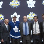 Toronto Maple Leafs first overall pick Auston Matthews, fourth from left, stands with members of the Maple Leafs management team at the NHL draft in Buffalo, N.Y., Friday June 24, 2016. (Nathan Denette/The Canadian Press via AP) MANDATORY CREDIT