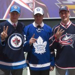 The NHL top three draft picks, Patrik Laine, Winnipeg Jets; Auston Matthews, Toronto Maple Leafs; and Pierre-Luc Dubois, Columbus Blue Jackets, pose for a photo at the NHL hockey draft, Friday, June 24, 2016, in Buffalo, N.Y. (Nathan Denette/The Canadian Press via AP)