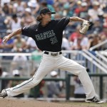Coastal Carolina pitcher Bobby Holmes throws against the Arizona in the sixth inning in Game 3 of the NCAA College World Series baseball finals in Omaha, Neb., Thursday, June 30, 2016. (AP Photo/Nati Harnik)