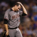 Arizona Diamondbacks relief pitcher Daniel Hudson reacts as he is pulled form the mound after giving up an RBI-single to Colorado Rockies' Charlie Blackmon in the eighth inning of a baseball game Thursday, June 23, 2016, in Denver. The Diamondbacks won 7-6. (AP Photo/David Zalubowski)