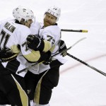 Pittsburgh Penguins' Evgeni Malkin, left, celebrates with Patric Hornqvist (72) after scoring a goal against the San Jose Sharks during the second period of Game 4 of the NHL hockey Stanley Cup Finals, Monday, June 6, 2016, in San Jose, Calif. (AP Photo/Eric Risberg)