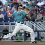 Coastal Carolina pitcher Mike Morrison throws against Arizona in the first inning in Game 2 of the NCAA Men's College World Series finals baseball game in Omaha, Neb., Tuesday, June 28, 2016. (AP Photo/Nati Harnik)