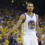 Golden State Warriors guard Stephen Curry (30) gestures during the first half of Game 7 of basketball's NBA Finals between the Warriors and the Cleveland Cavaliers in Oakland, Calif., Sunday, June 19, 2016. (AP Photo/Marcio Jose Sanchez)