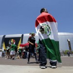 Victor Loera stands outside the stadium prior to a Copa America group C soccer match between Mexico and Uruguay at University of Phoenix Stadium, Sunday, June 5, 2016, in Glendale, Ariz. (AP Photo/Matt York)